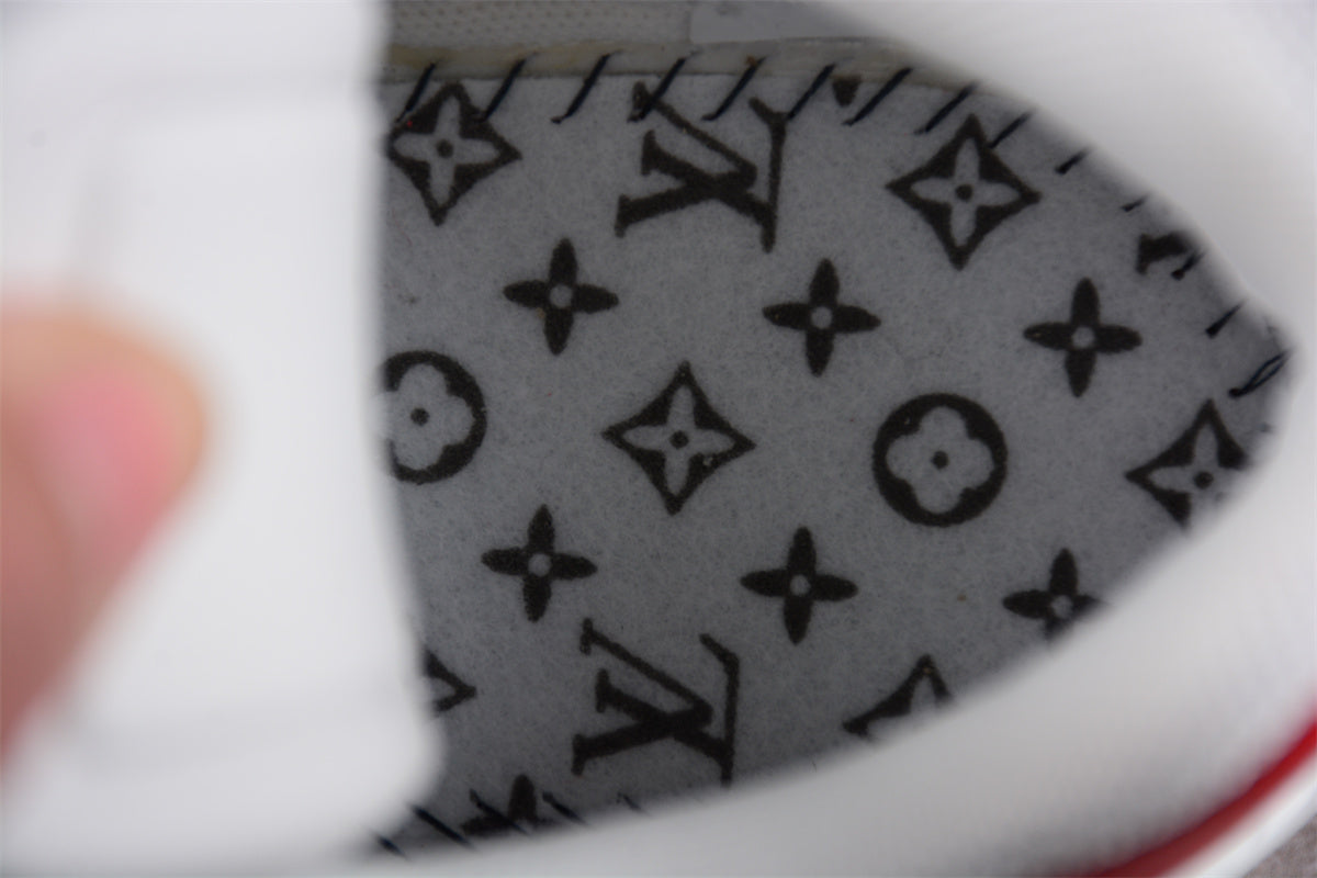 LV Trainers white and red spots