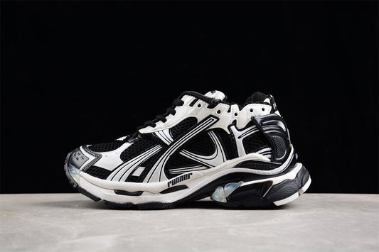Balenciaga Runner Trainers | Black and white