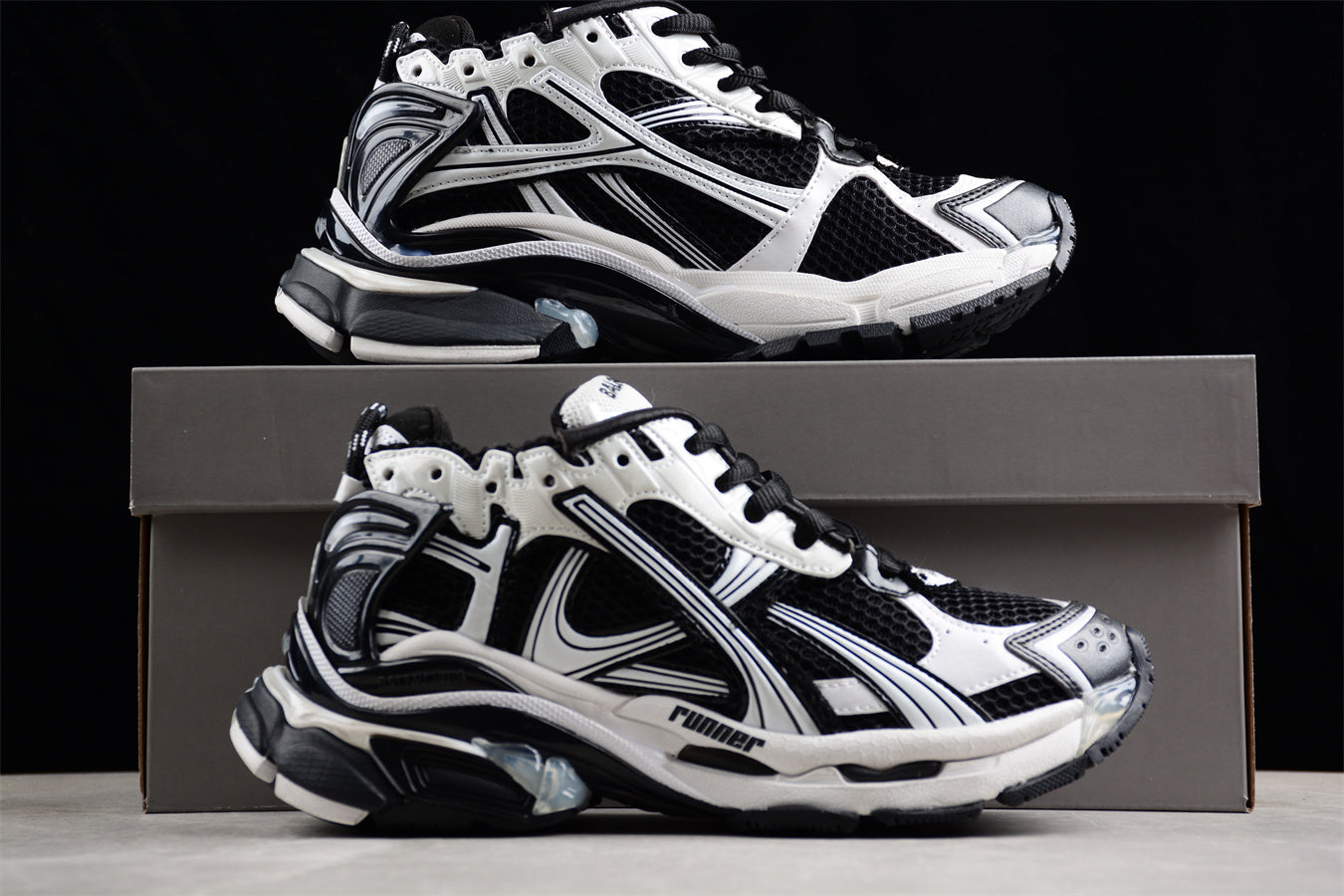 Balenciaga Runner Trainers | Black and white