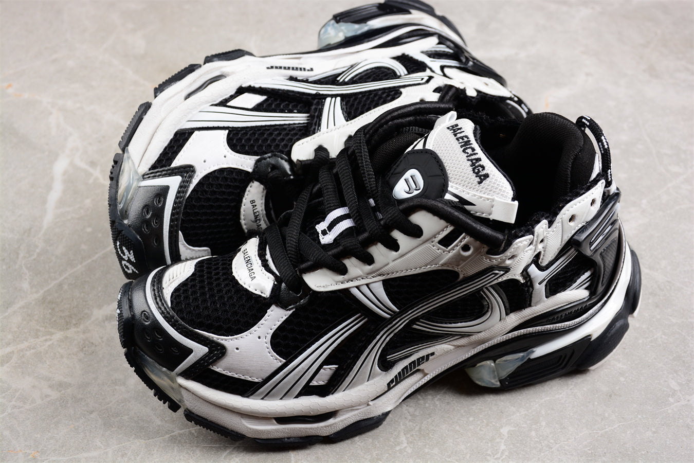 Balenciaga Runner Trainers | Black and white